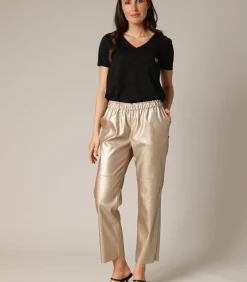 Deeluxe SAJAMA - Satijnen rechte broek met elastische taille gold Sale